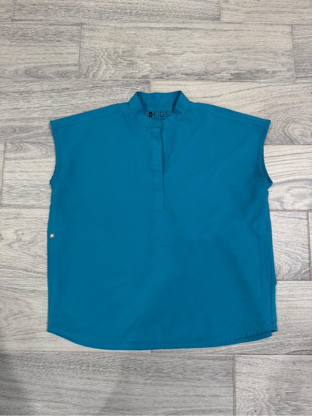 FIGS Women’s Rafaela Teal Sleeveless Scrub Top